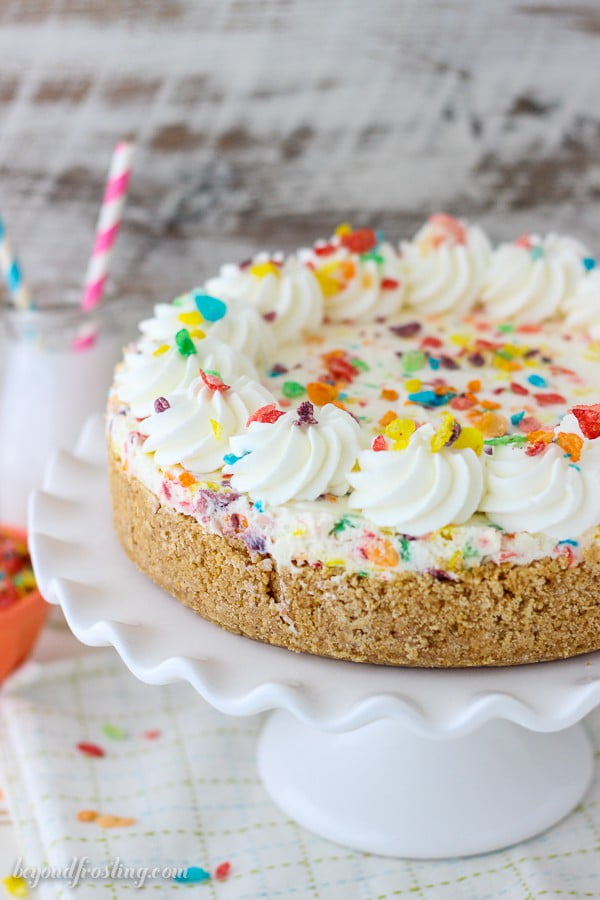 no-bake cake recipes No-bake Fruit Pebbles Cheesecake on White Cake Plate