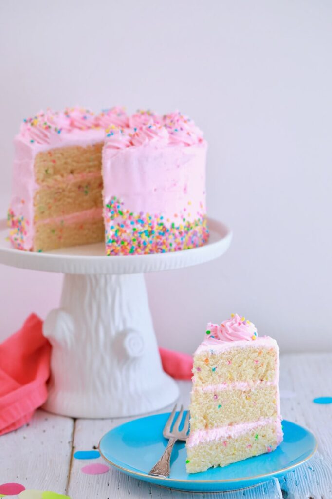 no-bake cake recipes 3 Layer No-bake Cake with Pink Frosting and Sprinkles