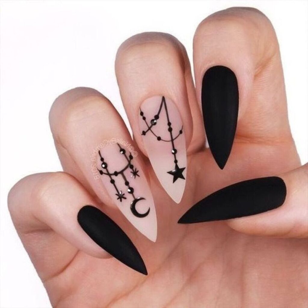 black star and moon stiletto nails