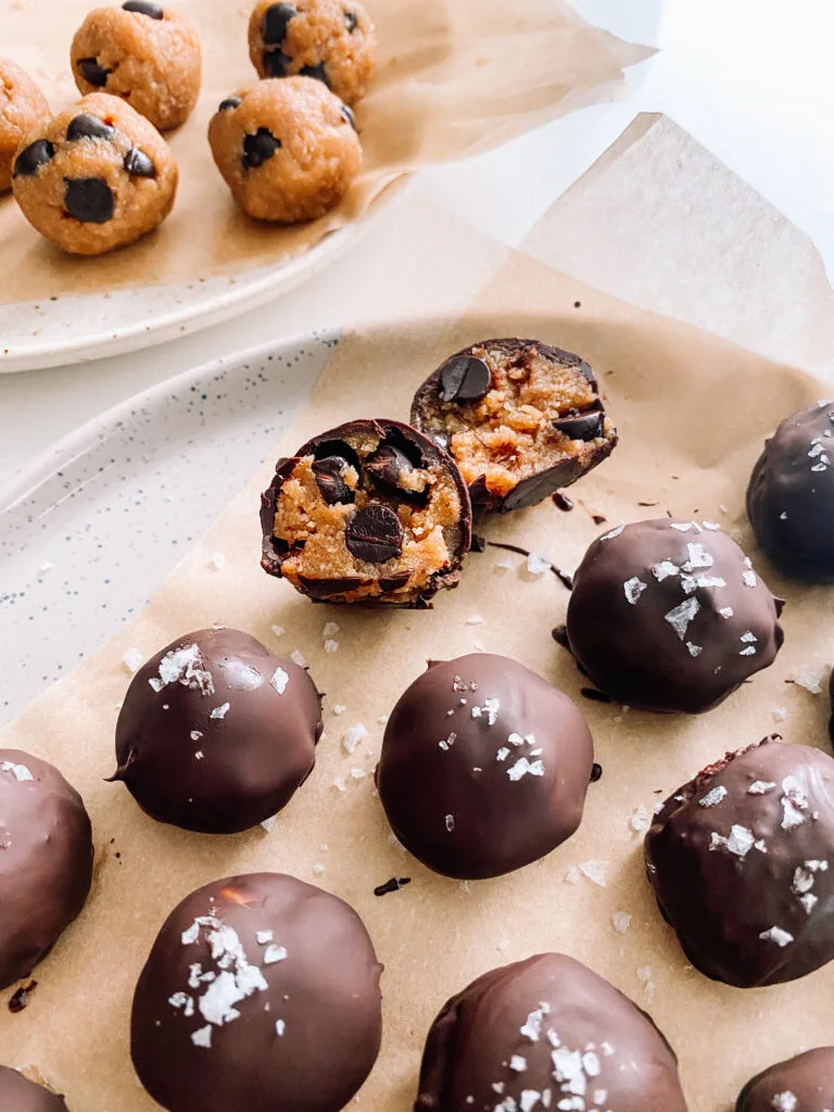 chocolate-coated dessert balls with sea salt flakes and gooey chocolate chip centers